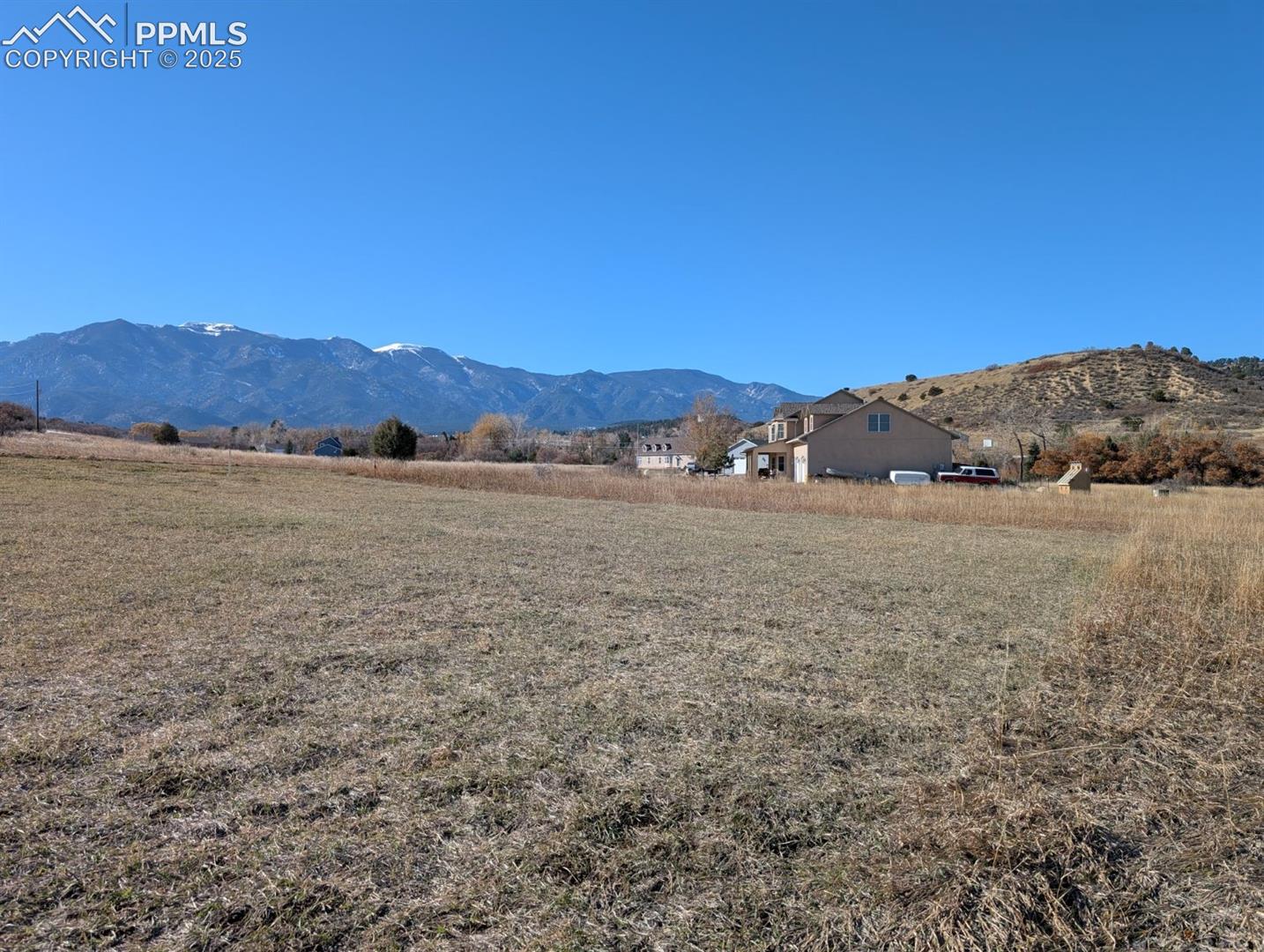 3180 Palumar Road Pueblo, CO 81004 - Photo 1 of 3 View of mountain feature featuring a rural view