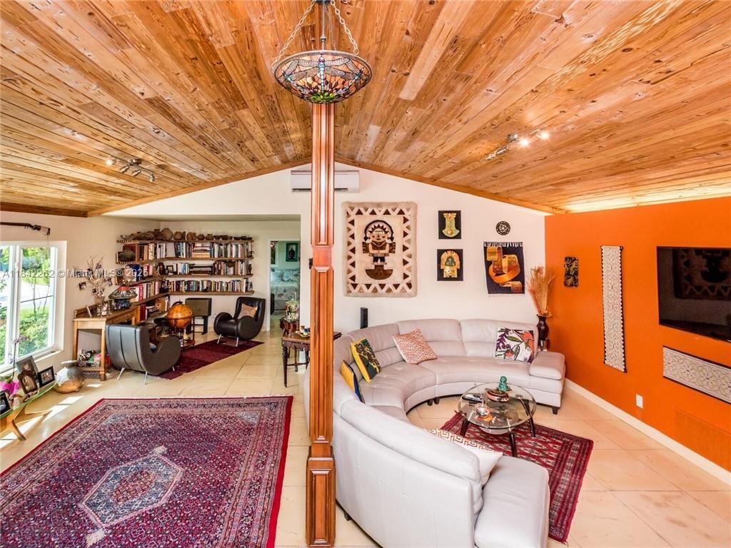 2616 Northeast 26th Avenue Lighthouse Point, FL 33064 - Photo 7 of 30 a very nice looking room with a large window