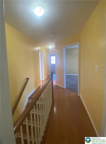 a view of hallway with stairs