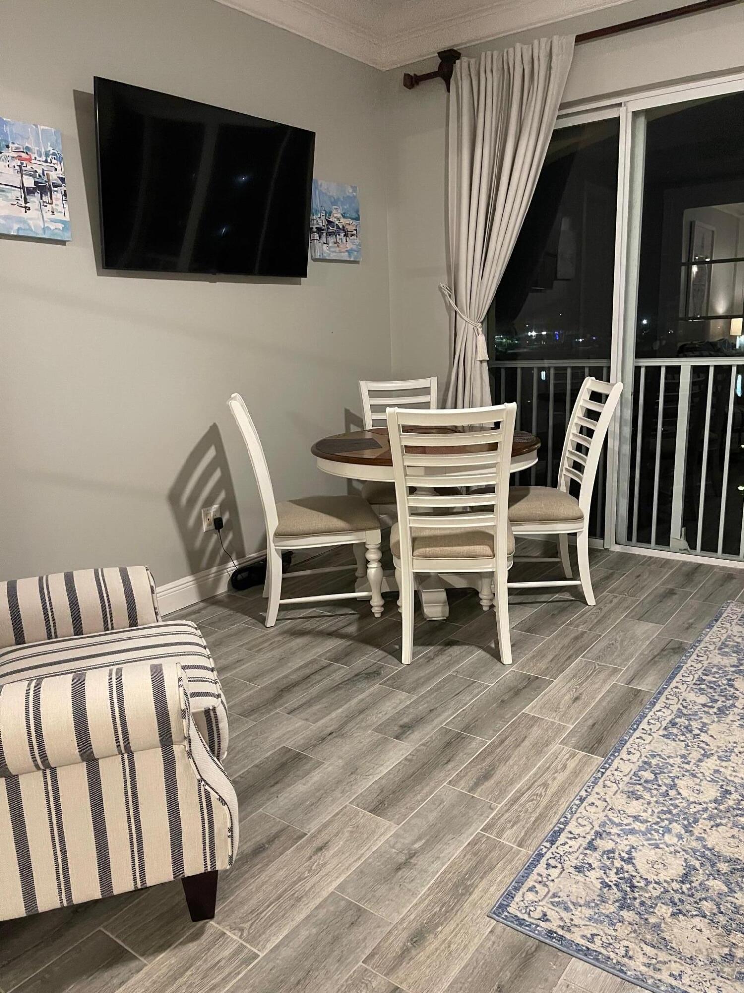 16 Harbour Isle Drive West, Unit 304 Fort Pierce, FL 34949 - Photo 14 of 17 a view of a livingroom with furniture and staircase