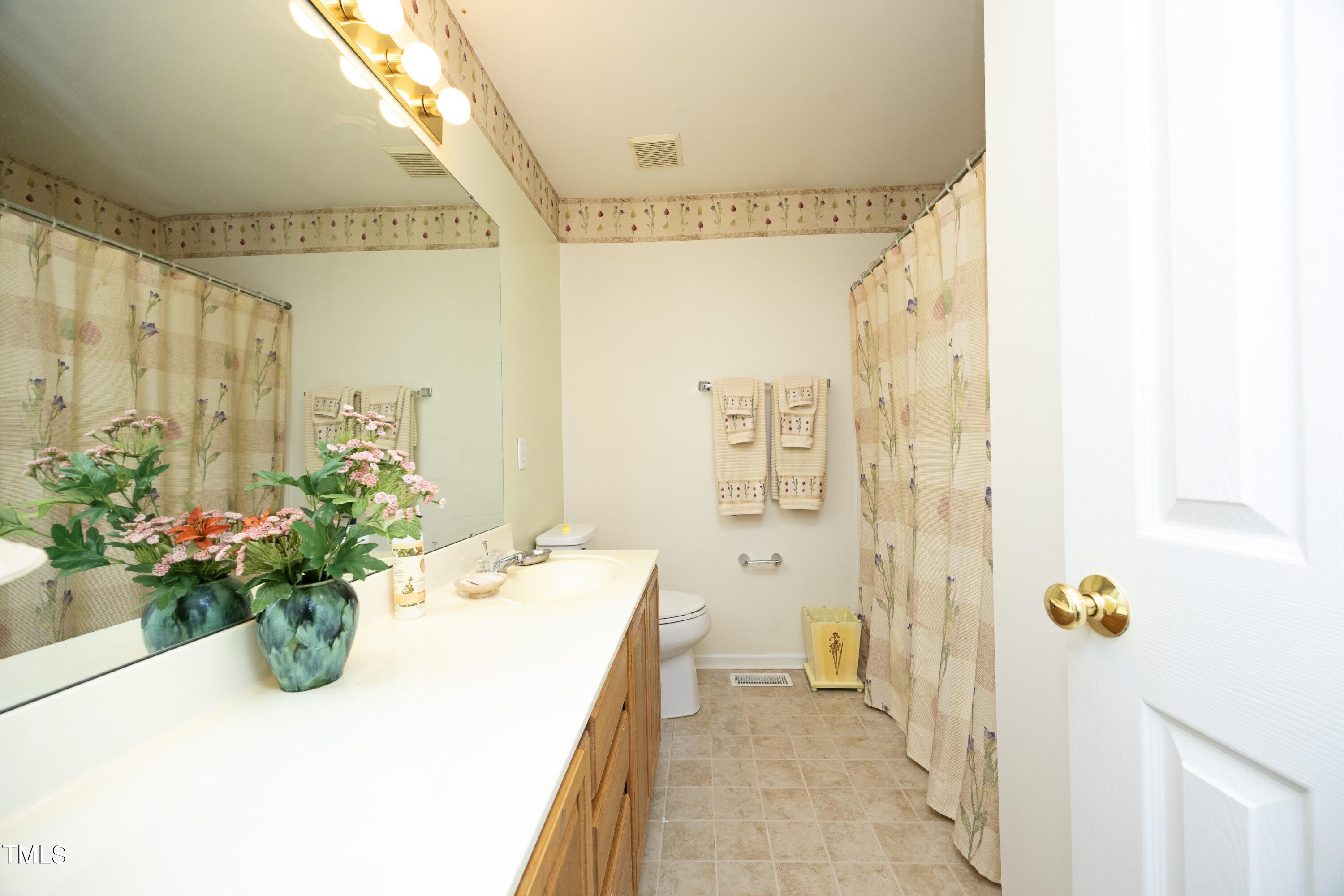 8909 Blakehurst Drive Raleigh, NC 27617 - Photo 27 of 35 27FullBath