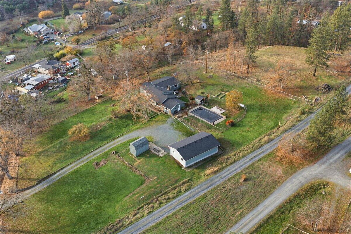 1360 Oxyoke Road Grants Pass, OR 97526 - Photo 31 of 39 a view of a lake with a yard