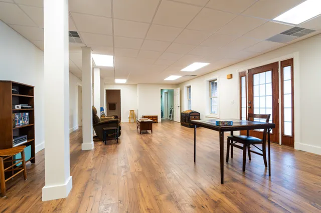 a utility room with sink dryer and washer