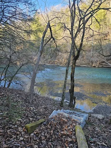 a view of a swimming pool with a mountain
