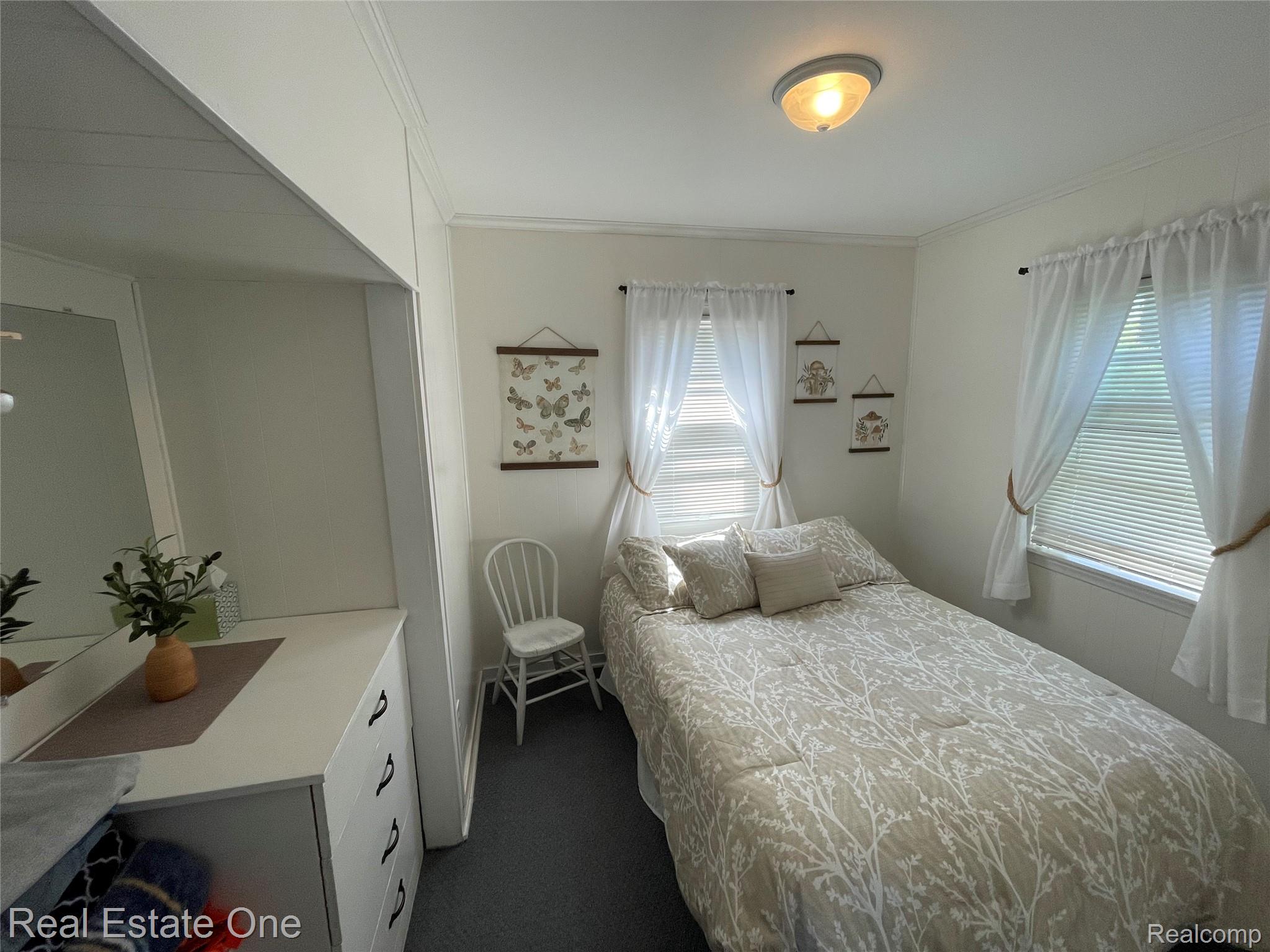 4160 Hawk Road Lincoln, MI 48742 - Photo 28 of 48 White-painted walls and trim create a bright interior