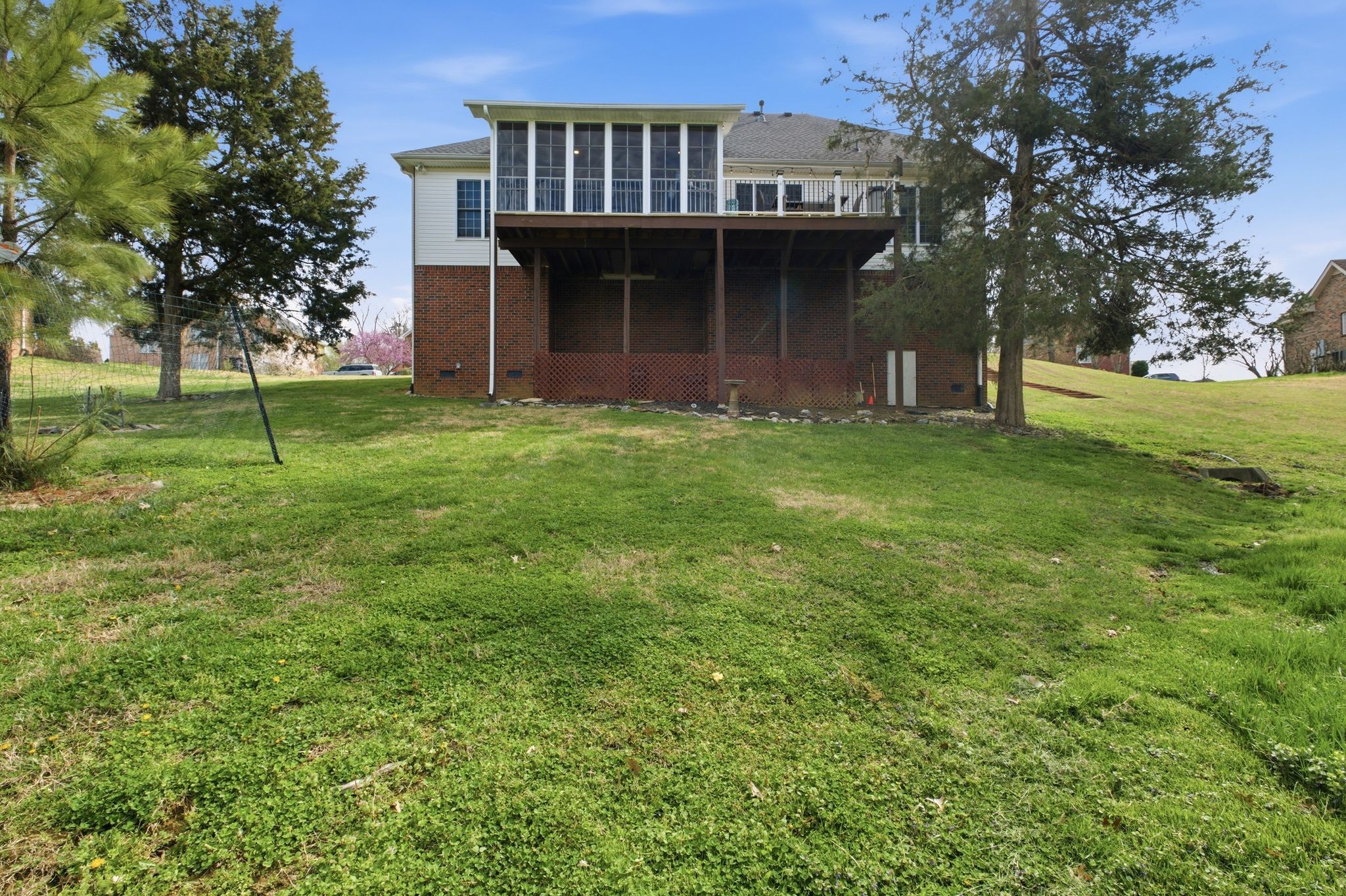 130 Cedar Ridge Lane Hendersonville, TN 37075 - Photo 37 of 37 a view of a house with a backyard and a tree