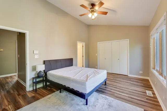 a view of a patio with couple of chairs