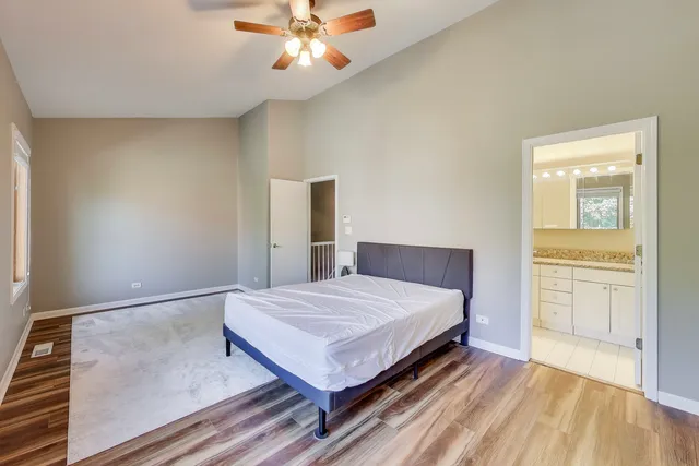 a view of a patio with couple of chairs