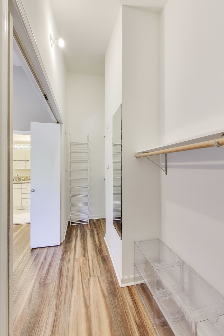 2305 West Thomas Street, Unit 1 Chicago, IL 60622 - Photo 21 of 34 a view of a room with wooden floor