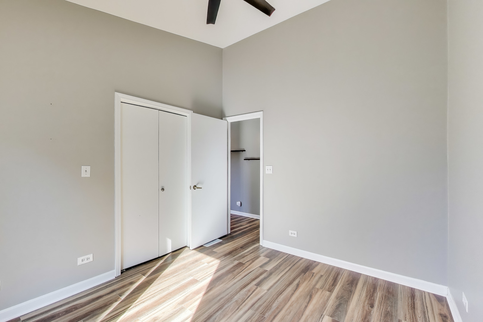 2305 West Thomas Street, Unit 1 Chicago, IL 60622 - Photo 23 of 34 a view of an empty room with closet and a window