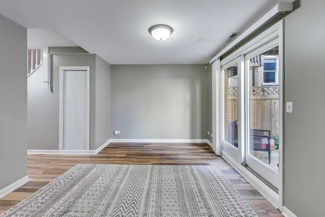 a kitchen with stainless steel appliances granite countertop a refrigerator stove and sink