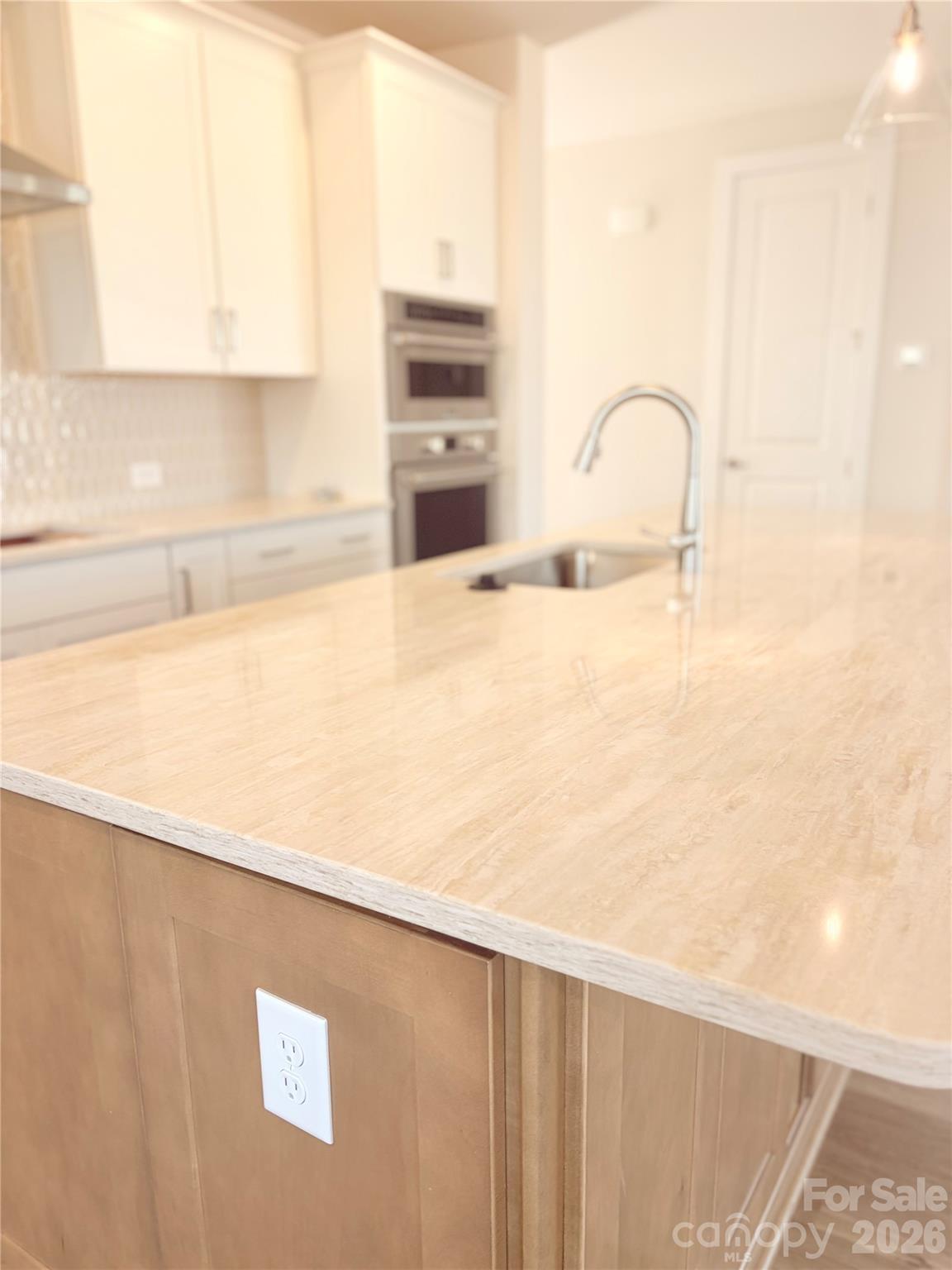 5214 Holw Br Road Charlotte, NC 28278 - Photo 15 of 17 a kitchen with a refrigerator and a sink