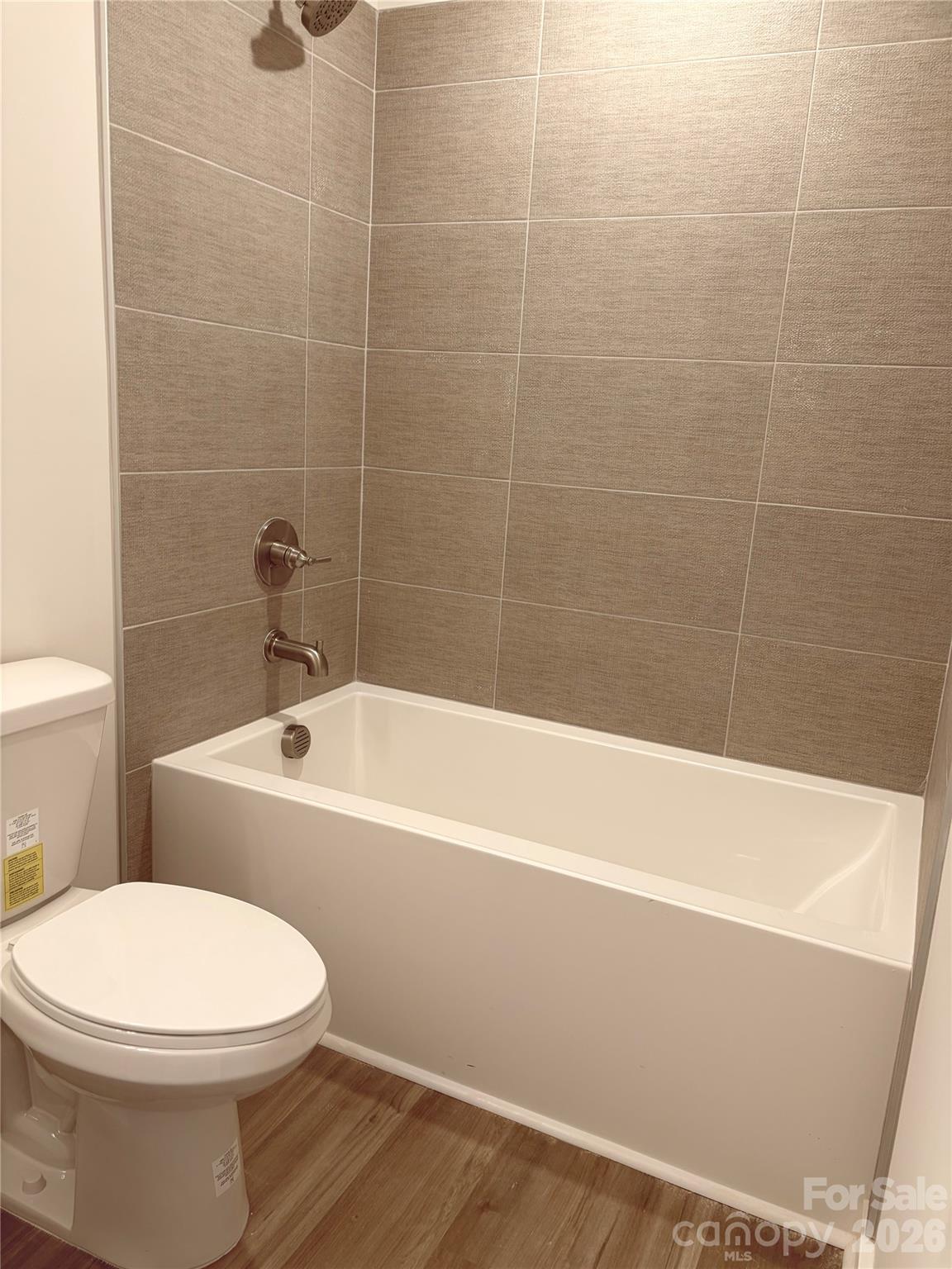 5214 Holw Br Road Charlotte, NC 28278 - Photo 8 of 17 a bathroom with a toilet bathtub and shower