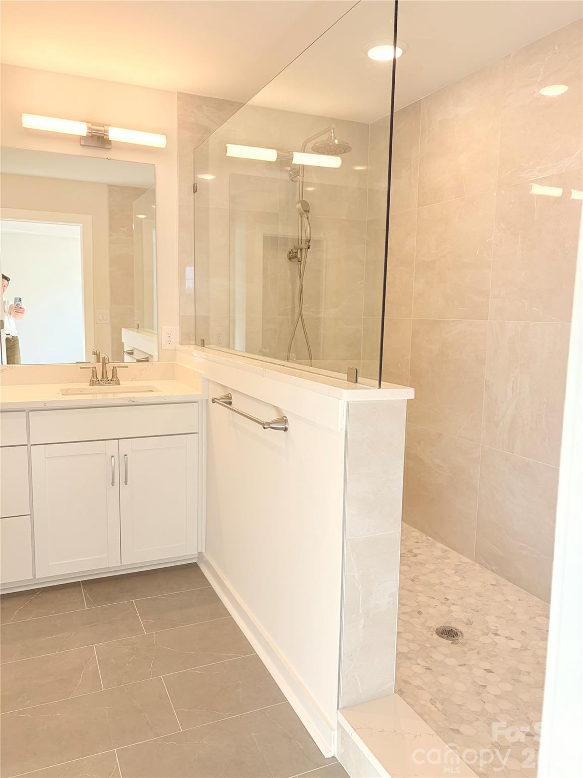 5214 Holw Br Road Charlotte, NC 28278 - Photo 9 of 17 a utility room with cabinets washer and dryer