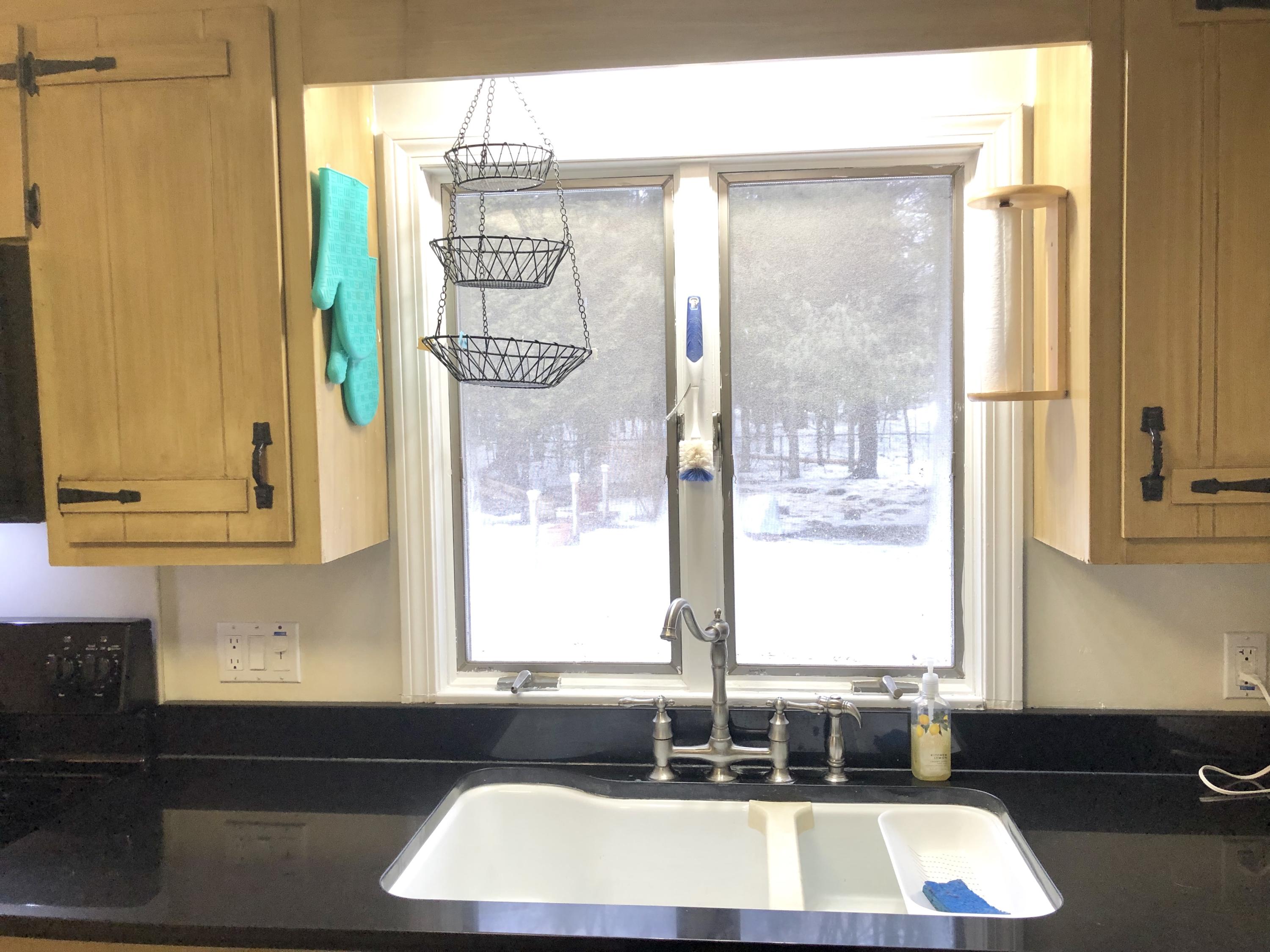 1051 Norway Road Glenburn, ME 04401 - Photo 17 of 45 Kitchen Sink Overlooking Backyard
