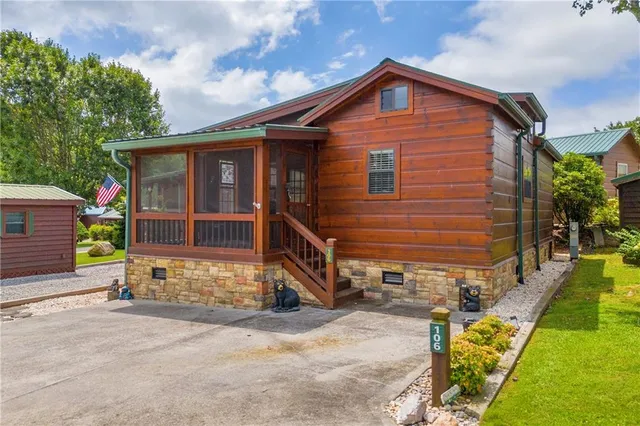 a view of a dining room with furniture and window