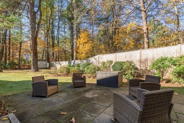 a view of backyard with seating space