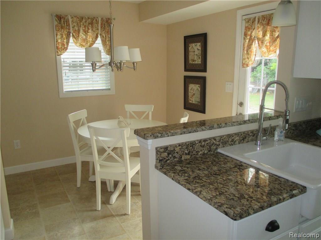 9605 Merriman Road Livonia, MI 48150 - Photo 12 of 27 Eat-In Kitchen with French Door to Deck