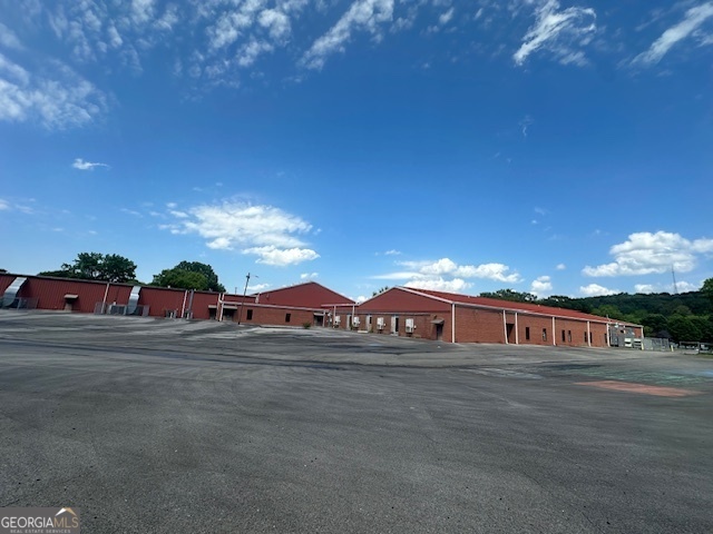 13 Rome Street Cave Spring, GA 30124 - Photo 5 of 9 a view of a big house with a big yard