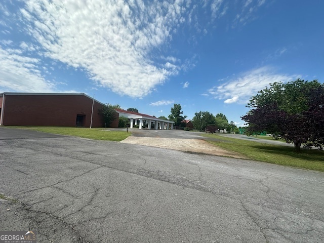 13 Rome Street Cave Spring, GA 30124 - Photo 9 of 9 a view of the field of grass and trees