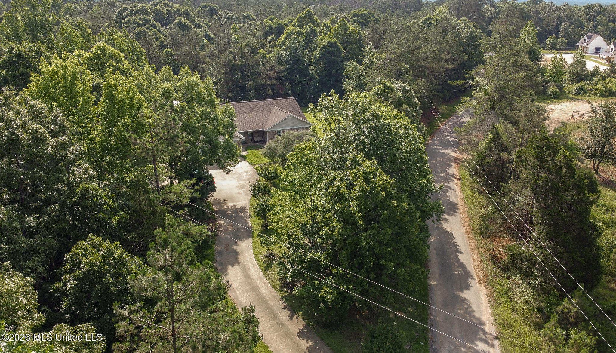 65 Chewalla Lake Road Holly Springs, MS 38635 - Photo 21 of 35 Front drive and Chewalla Lake rd.