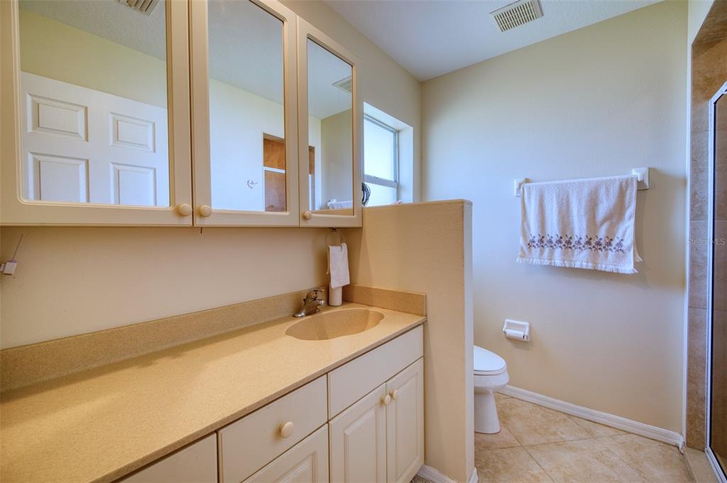 541 Falkland Road Venice, FL 34293 - Photo 9 of 22 a bathroom with a sink and a vanity