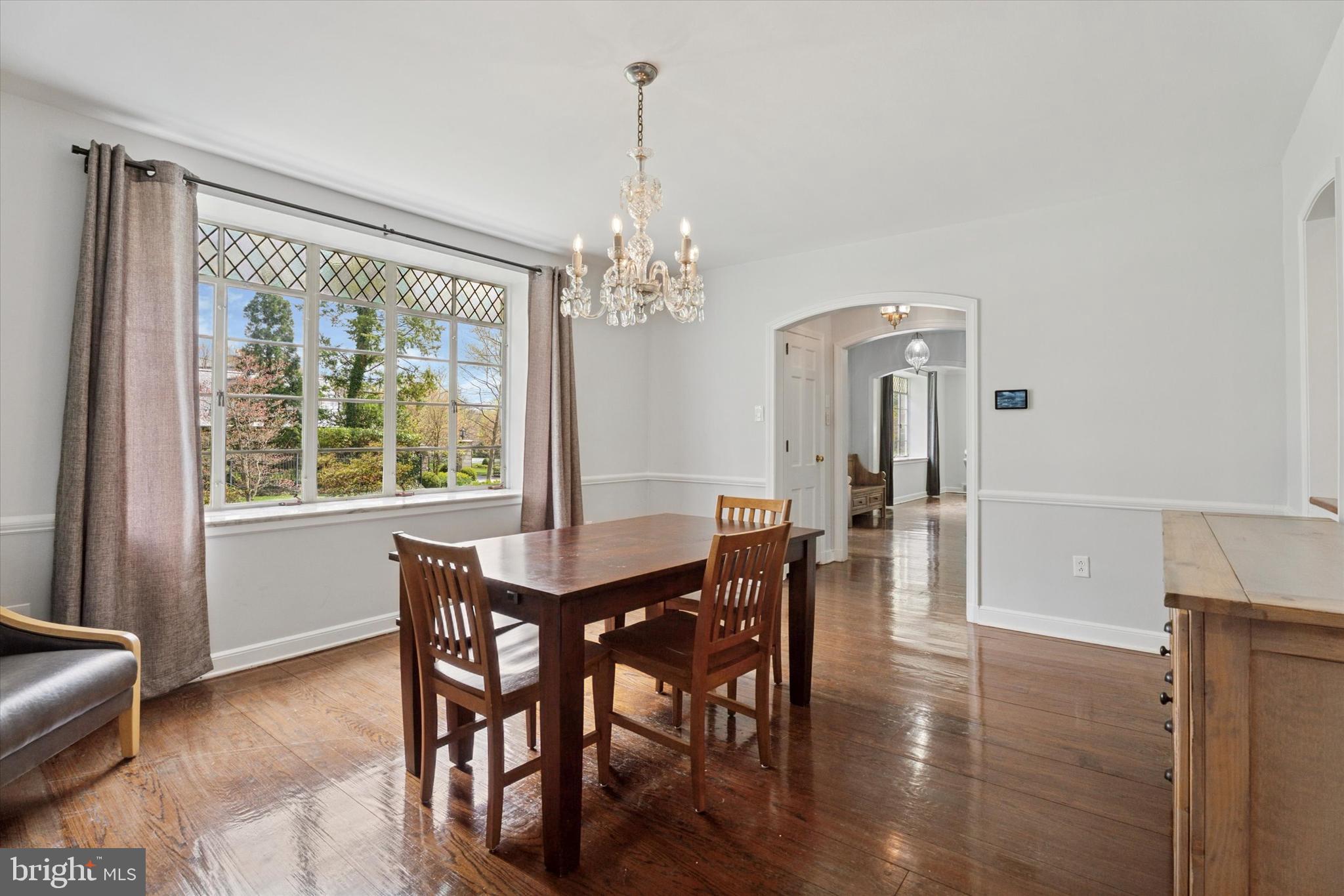 110 Raynham Road Merion Station, PA 19066 - Photo 28 of 59 a view of a dining room with furniture window and wooden floor