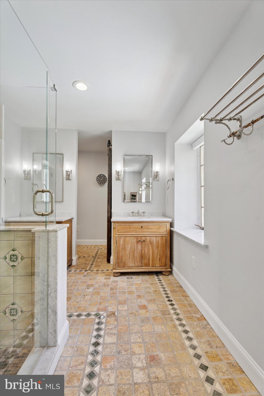 110 Raynham Road Merion Station, PA 19066 - Photo 37 of 59 a large bathroom with a large tub shower and sink