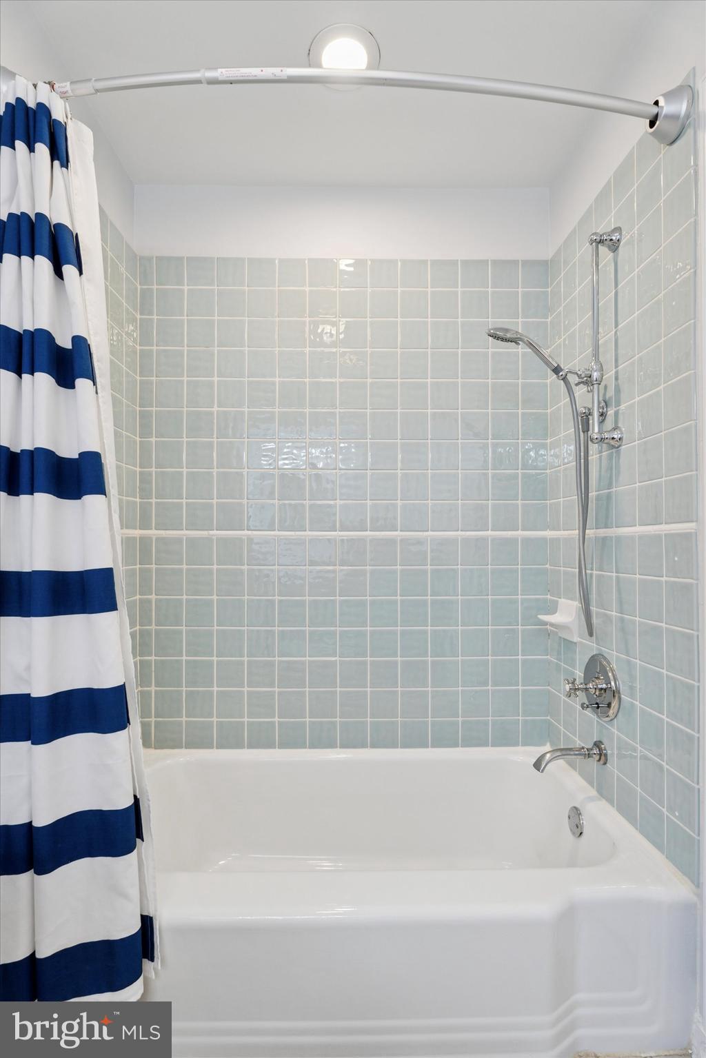 110 Raynham Road Merion Station, PA 19066 - Photo 44 of 59 a bathroom with a bathtub and a shower