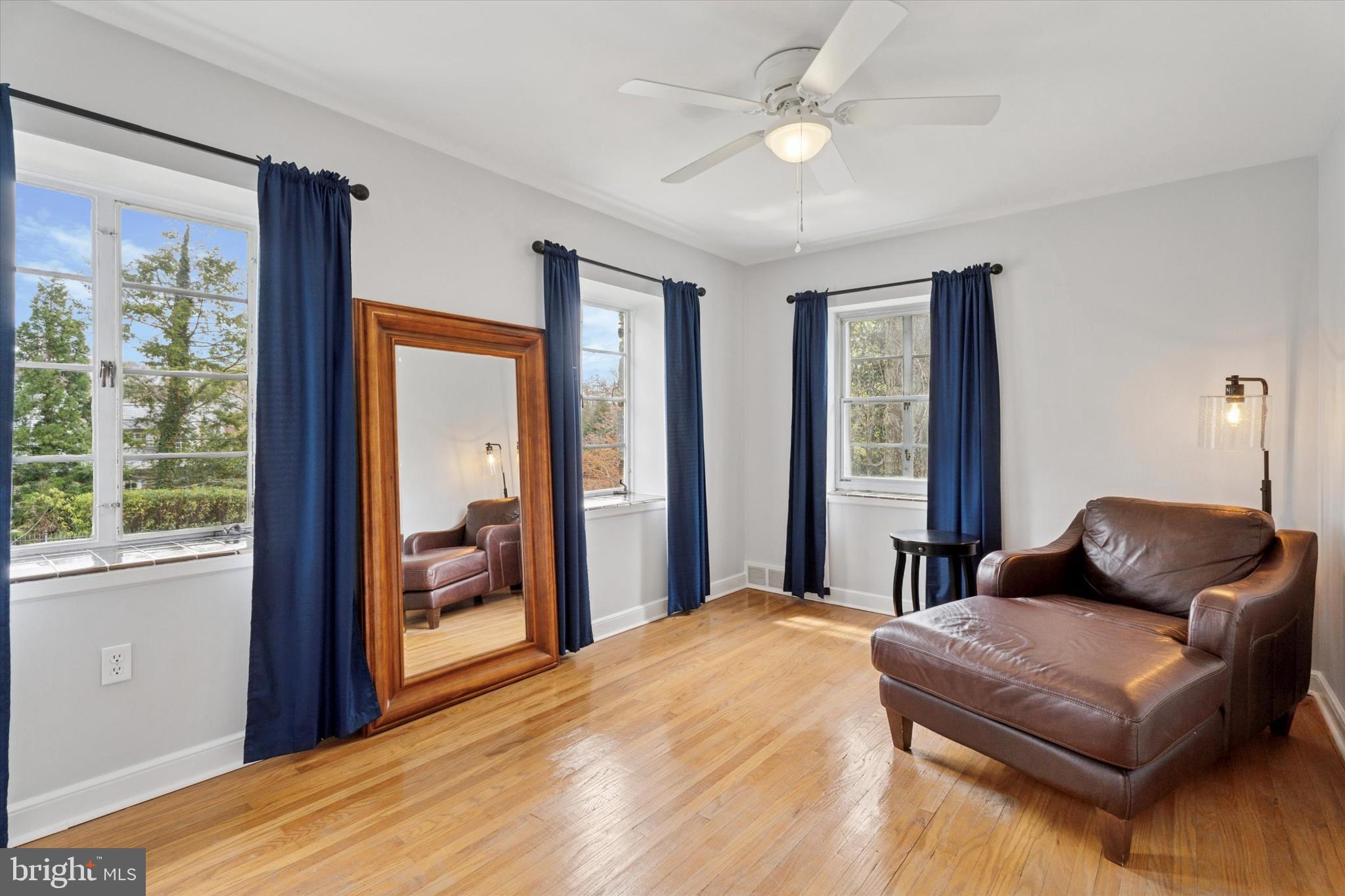 110 Raynham Road Merion Station, PA 19066 - Photo 45 of 59 a bedroom with a bed couch and a large window