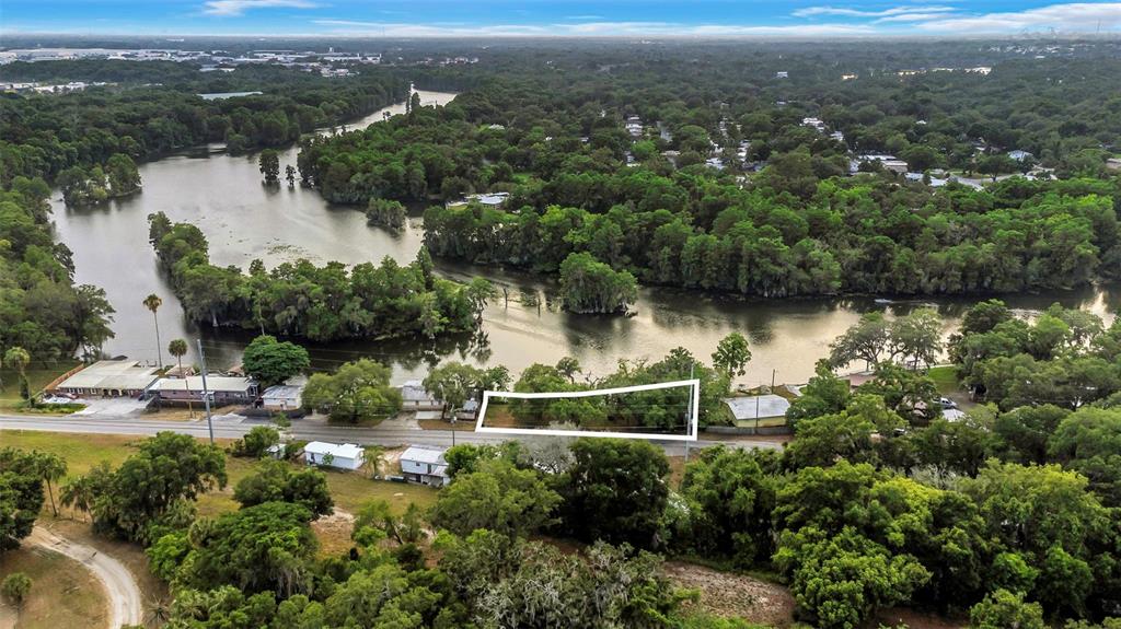 Harney Tampa, FL 33610 - Photo 11 of 13 an aerial view of lake residential house with outdoor space