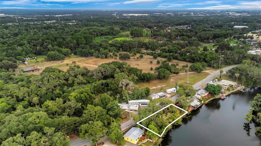 Harney Tampa, FL 33610 - Photo 12 of 13 an aerial view of a house with a lake view