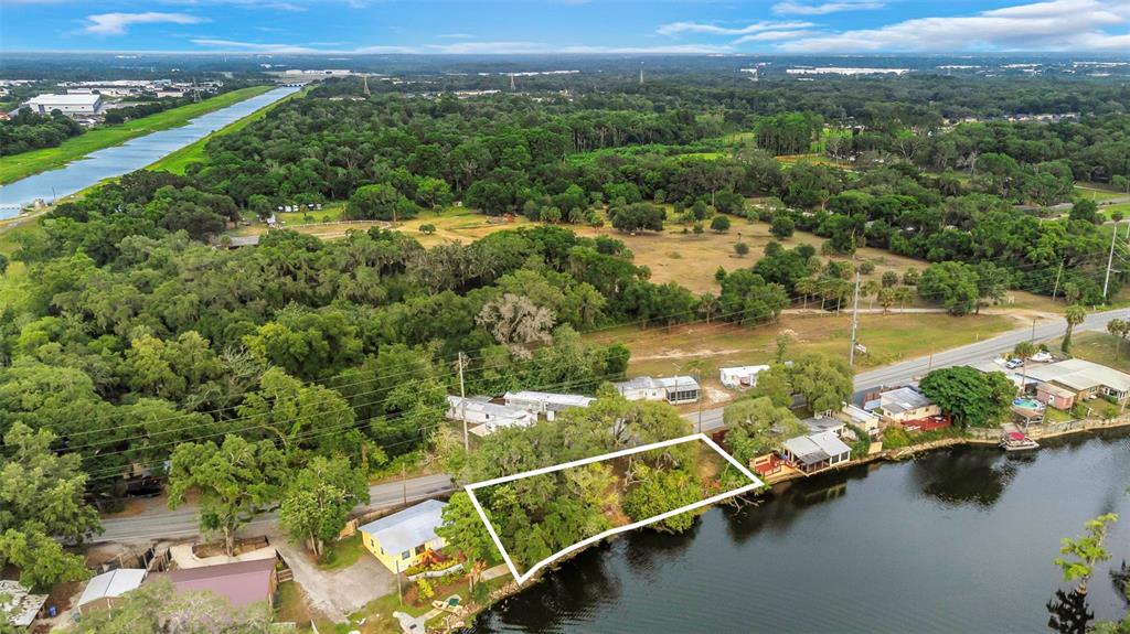 Harney Tampa, FL 33610 - Photo 13 of 13 an aerial view of a house with a lake view