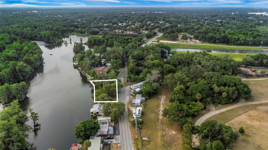 Harney Tampa, FL 33610 - Photo 8 of 13 an aerial view of a house with a yard