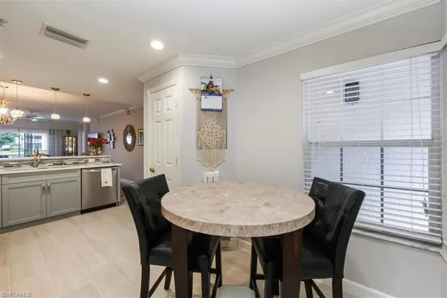 a spacious bedroom with a bed and a window