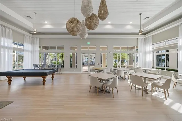 a view of a living room and dining room