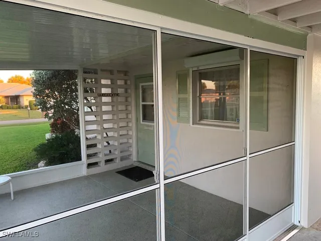 a view of outdoor space and front view of a house