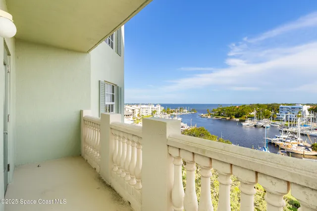 a view of kitchen with furniture and large window