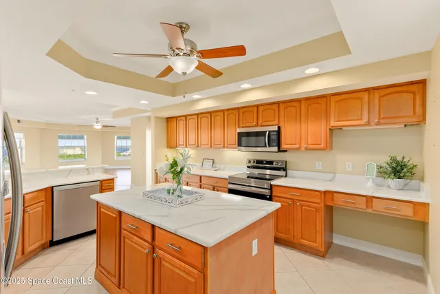 a large kitchen with a large window