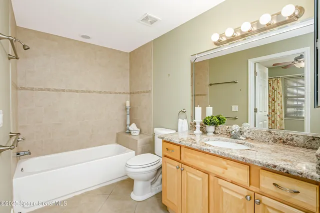 a view of a bathroom with a sink and a washer