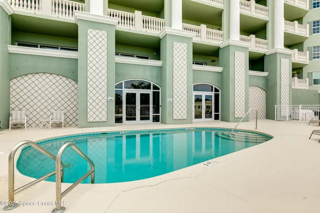 a view of a backyard with a garden and trees