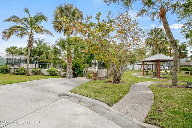 a view of a street with cars