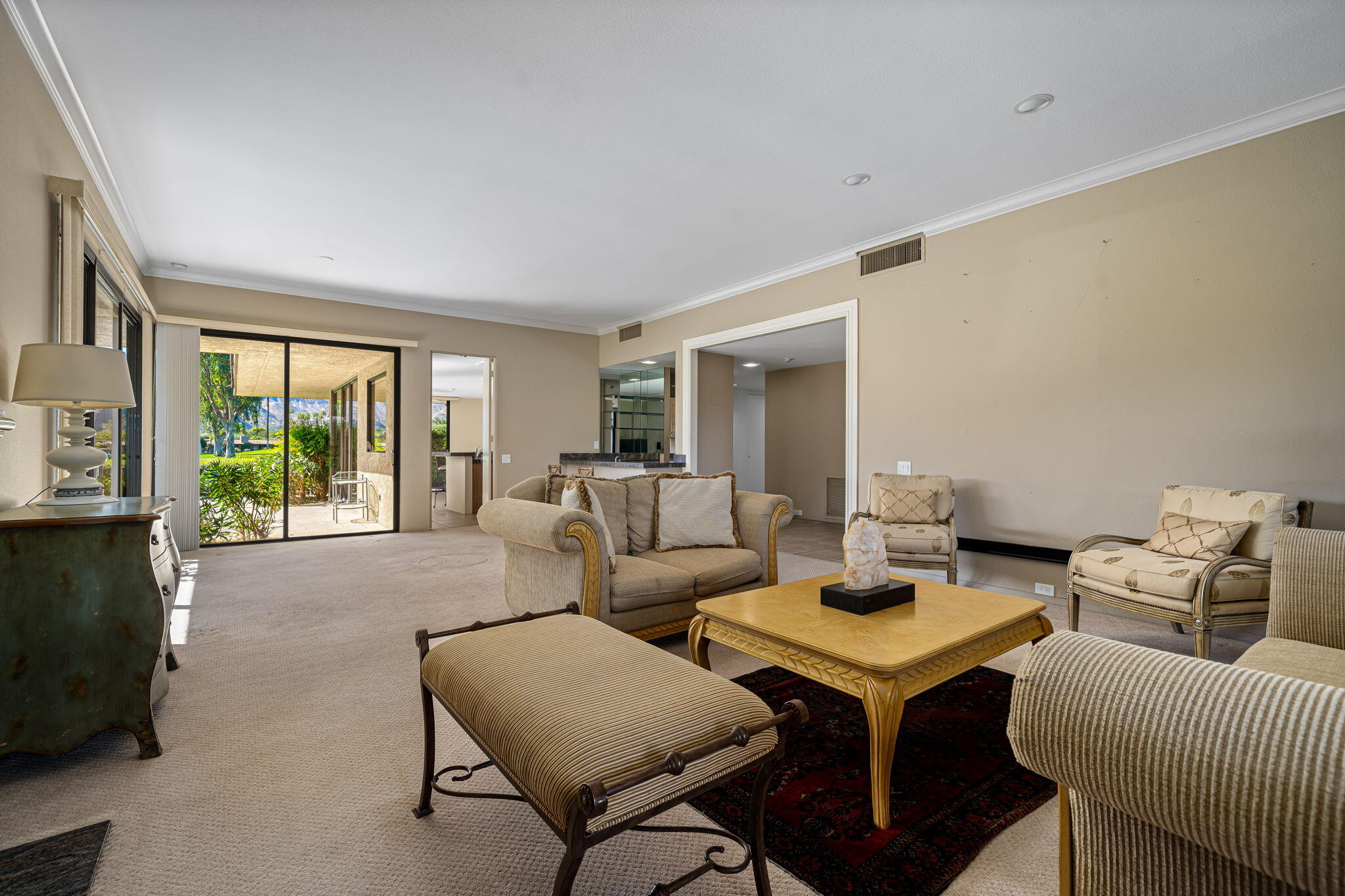 13 Duke Drive Rancho Mirage, CA 92270 - Photo 23 of 68 a living room with furniture and a flat screen tv