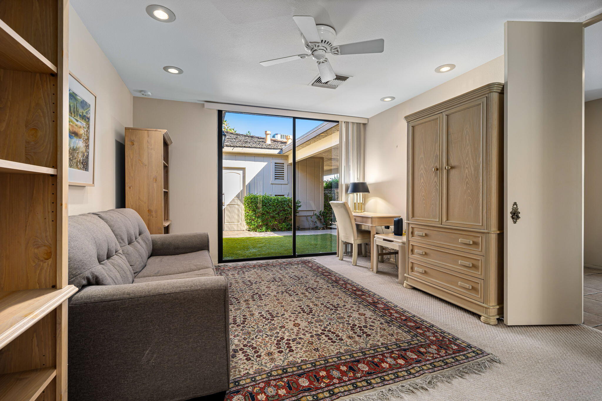 13 Duke Drive Rancho Mirage, CA 92270 - Photo 44 of 68 a living room with furniture and a window