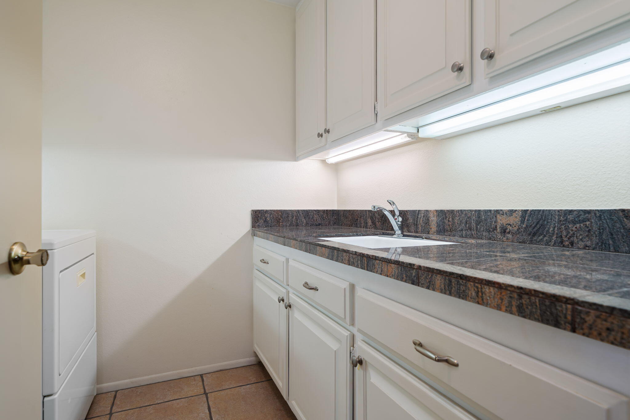 13 Duke Drive Rancho Mirage, CA 92270 - Photo 48 of 68 a close view of sink and tap