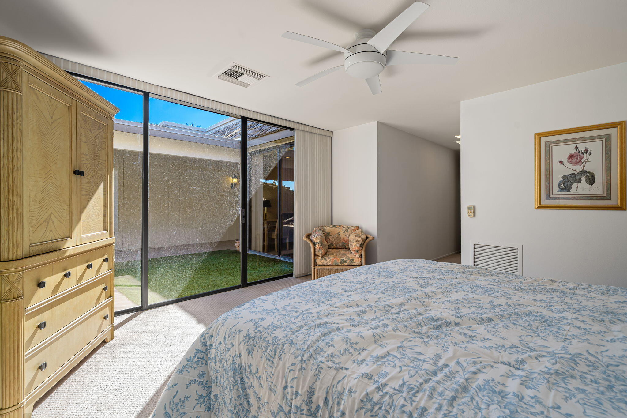 13 Duke Drive Rancho Mirage, CA 92270 - Photo 50 of 68 a bedroom with a bed and a mirror