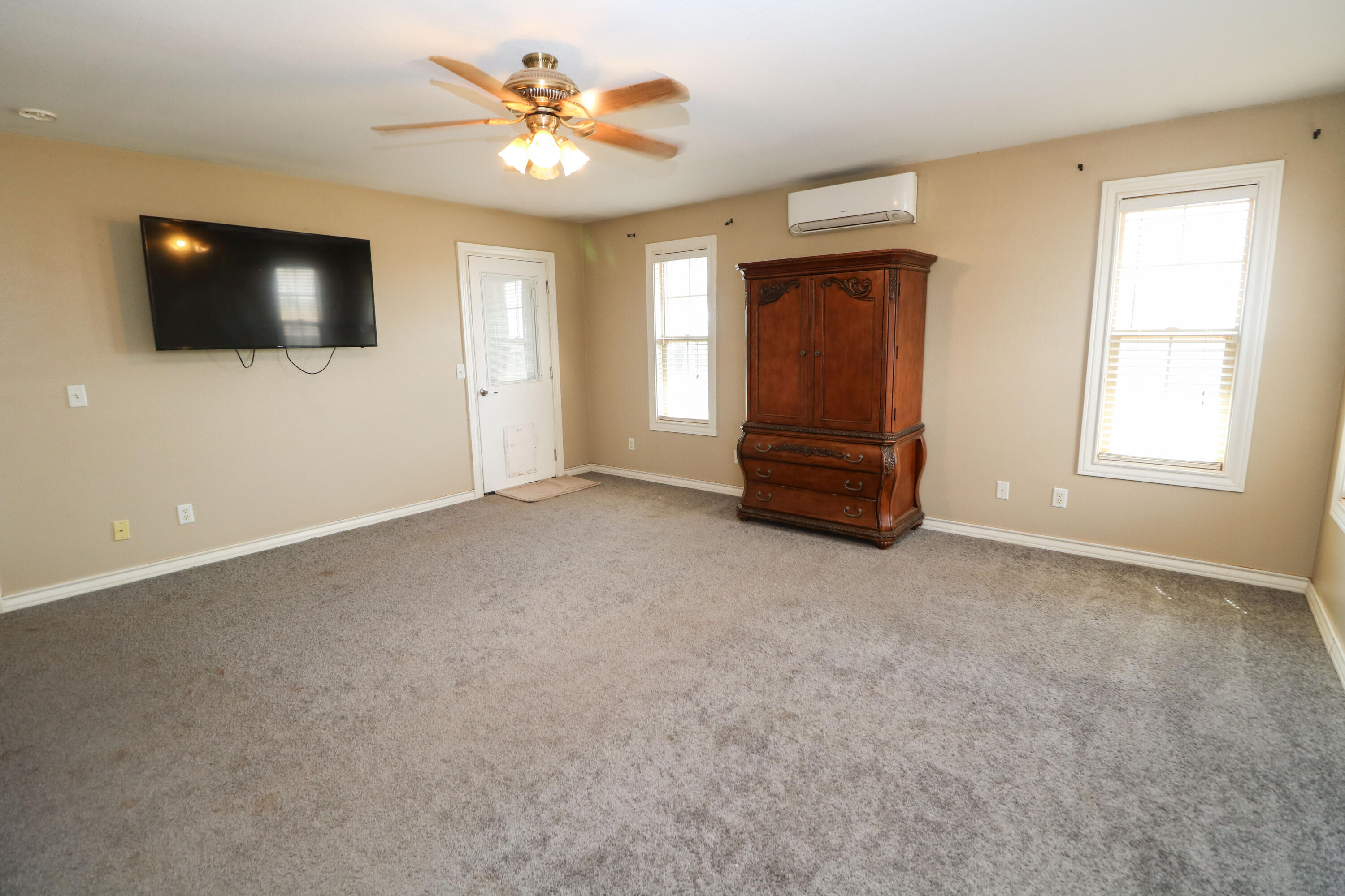 2401 Highway 385, Unit B Littlefield, TX 79339 - Photo 11 of 28 a view of an empty room with a window