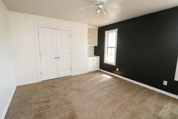 a view of an empty room with window