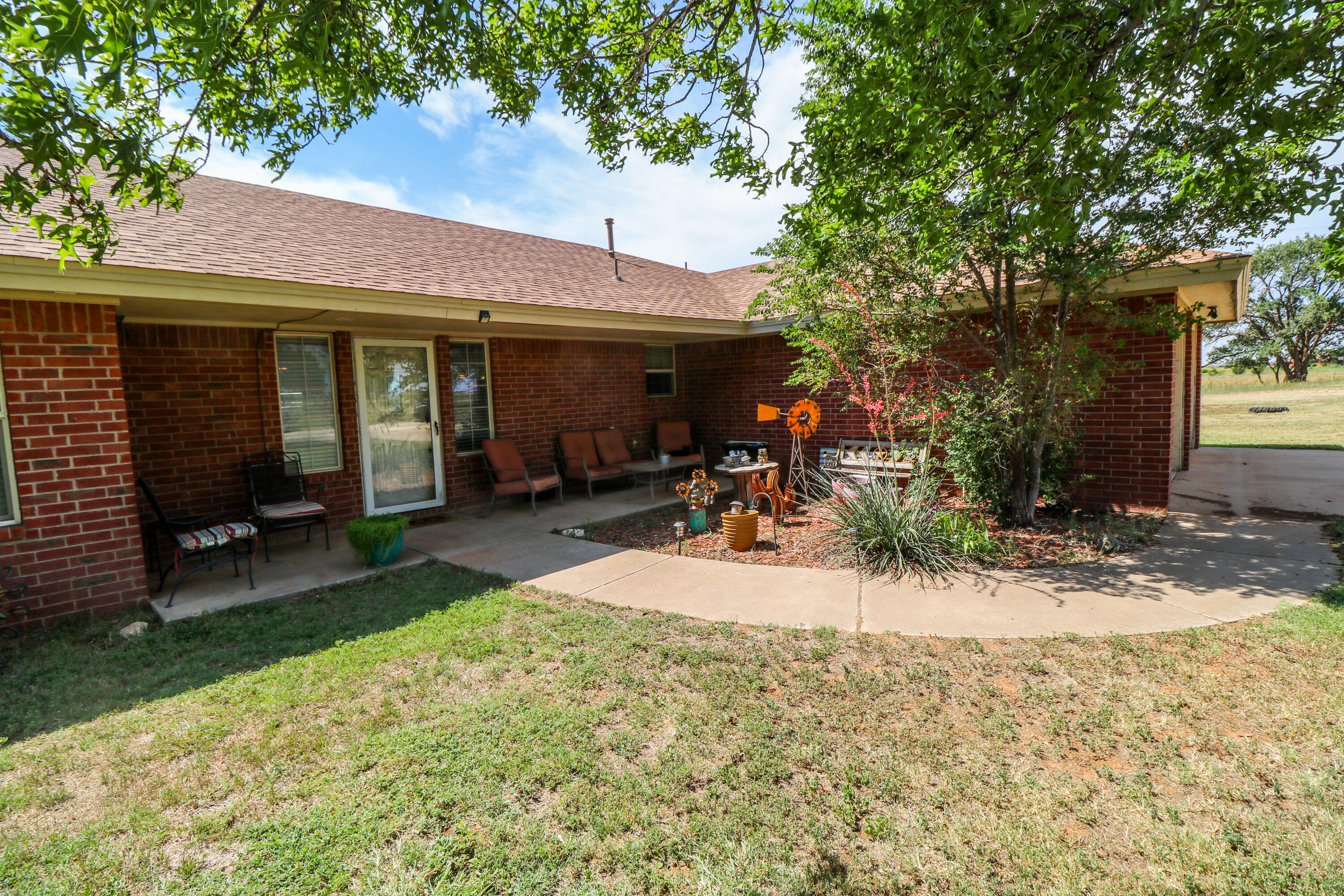 2401 Highway 385, Unit B Littlefield, TX 79339 - Photo 2 of 28 a view of a backyard of a house
