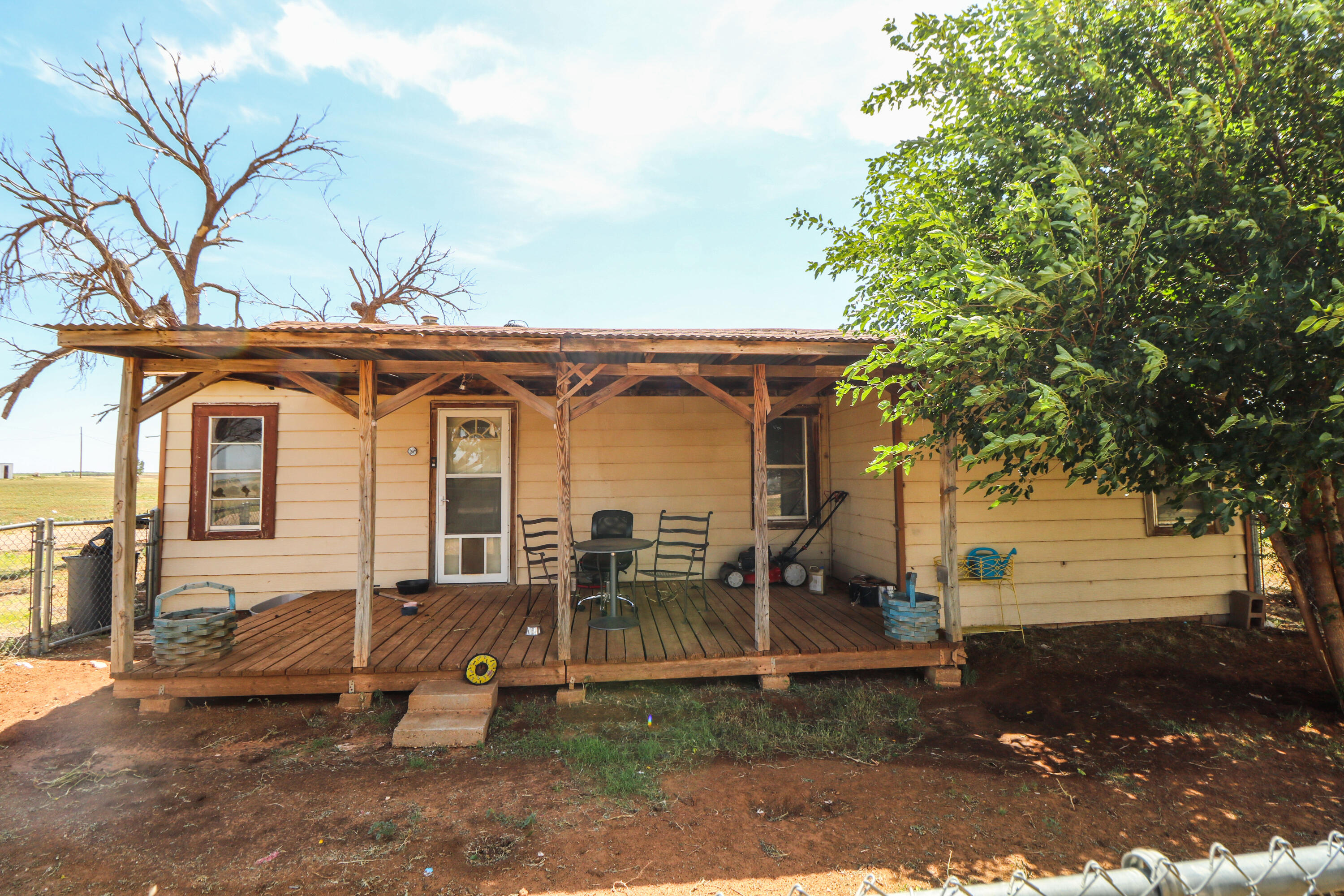 2401 Highway 385, Unit B Littlefield, TX 79339 - Photo 24 of 28 a front view of a house with garden